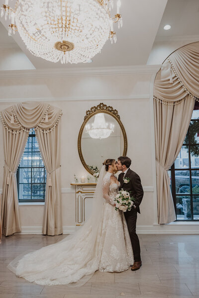 Couple kisses at the St Regis Washington DC