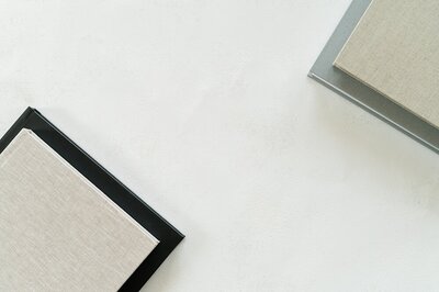 brand photos for brand design with books stacked on a white table