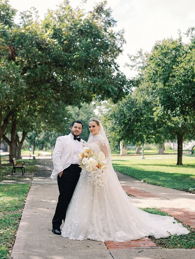 Bride and groom walk up memorial steps at their DC wedding