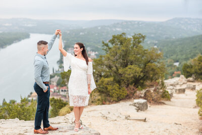 Couple celebrate their engagement  at Mount Bonnell in Austin, Texas.
