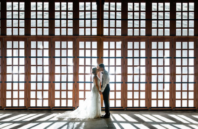 hotel granduca wedding phtoographer asian wedding couple kissing lobby