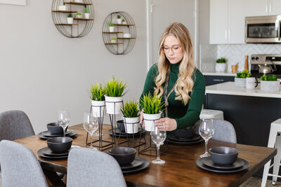 Southern Alberta Realtor Tamara working in a cozy coffee shop