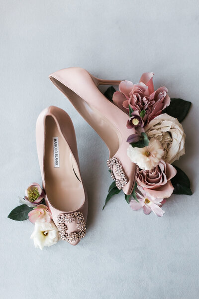 Manolo Blahnik wedding heels surrounded by florals