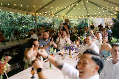 shadow of couple touching foreheads on a sailboat 