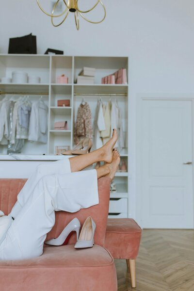 Blush pink and neutral toned custom closet space with a feminine touch