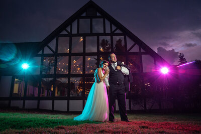 Bride and groom posing for wedding photos at Peek'n Peak Resort.