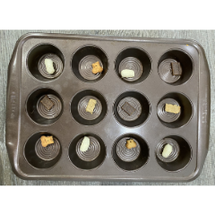 Winter indoor activity - step 2 - fill muffin tin with treats