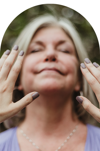 three people with hands in the air psychic reading