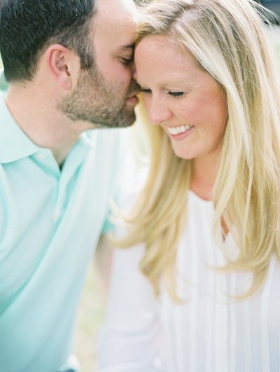 Light and Airy Engagement Photos with Groom in Aqua Polo and Bride in White Shirt Colorado Wedding Photographer © Bonnie Sen Photography
