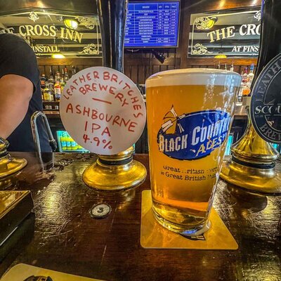 A pint of real ale on the bar at The Cross Pub Birmingham