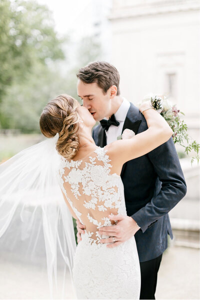 Bride & Groom smiling and talking during their wedding day portrait session