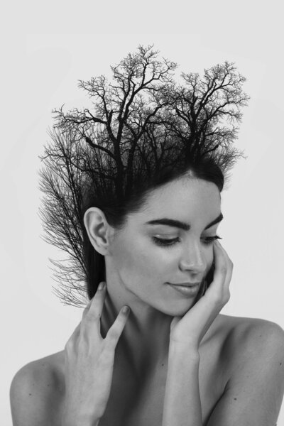medium-shot-woman-trees-double-exposure