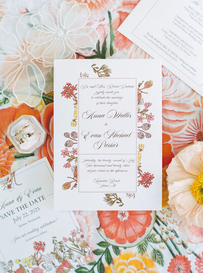 Colorful invite flat lay by Coryn Kiefer Photography