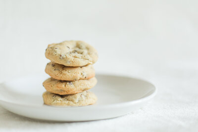 stack of four chocolate chip cookies