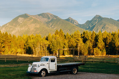 Mission Mountains and antique truck at Sky Ridge Ranch in Ronan, MT