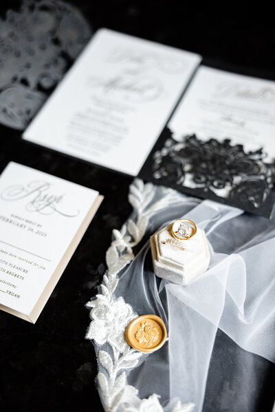Gorgeous wedding day details with black and gold colored accents in Laguna Beach California Ceremony. 