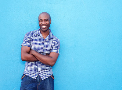 handsome-black-man-smiling-with-arms-crossed-PBDR7CZ