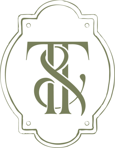 Submark logo of Ivory and Tweed in mossy