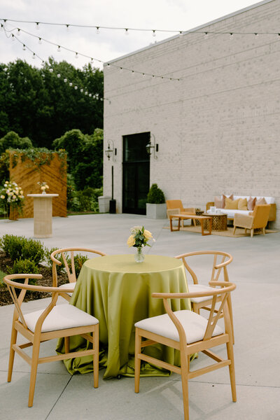outdoor patio with wishbone chairs