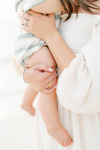 Mother hugs daughter during a Delaware Family photographer session
