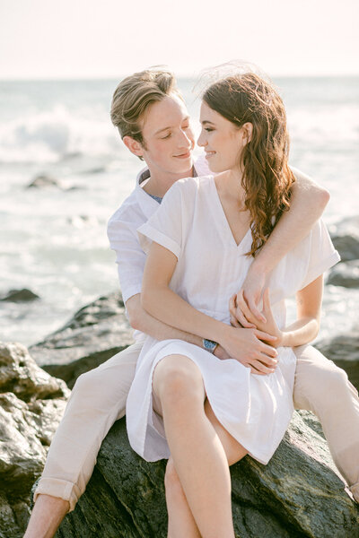 Seaside Bliss: Happy Couple Sitting on Beach | Christine Li Photography