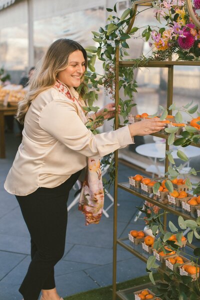 Carissa setting up a place card installation