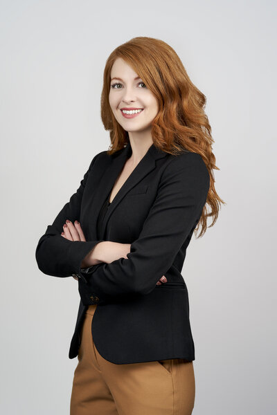 headshot of a women folding her arms