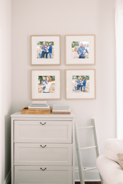 Photos hanging on wall taken by Apex Newborn Photographer