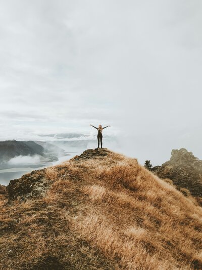 Photo by <a href="https://unsplash.com/@samscrim?utm_content=creditCopyText&utm_medium=referral&utm_source=unsplash">Samuel Scrimshaw</a> on <a href="https://unsplash.com/photos/woman-standing-on-top-of-hill-rJc1RioyERQ?utm_content=creditCopyText&utm_medium=referral&utm_source=unsplash">Unsplash</a>