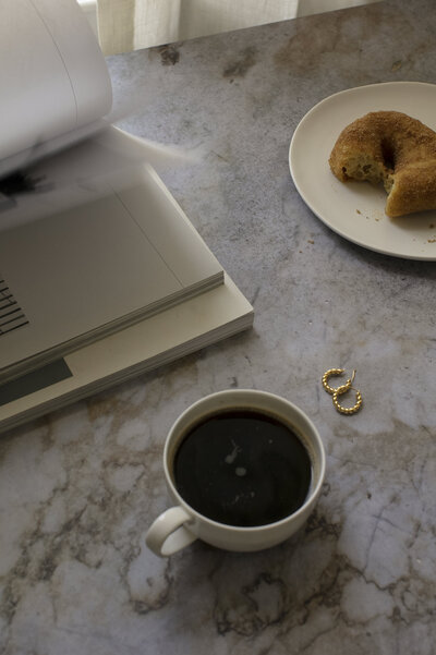 Bread and coffee on marble table