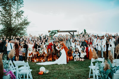 newlyweds and guests celebrating at an Utah wedding