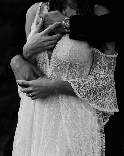 A photo of bride and groom in each others arms. Photo taken by Kollar Photography. Arizona Elopement Photographer