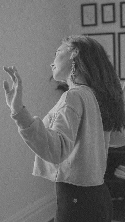 Tanner engaging in intuitive movement practice, intentionally shifting and releasing trauma energies through embodied CPTSD Medicine.