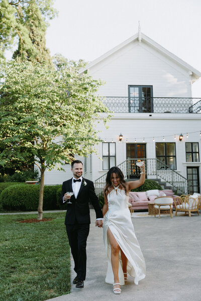 wedding arch with flowers and dried pampas