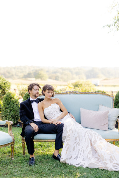 Wedding Photographer, couple with wedding flowers