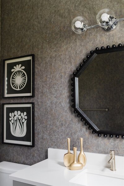 Black inspired bathroom with gold accents