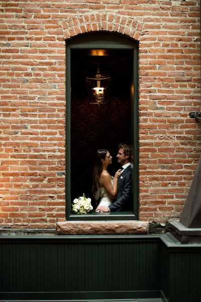 colorado couple embracing in window