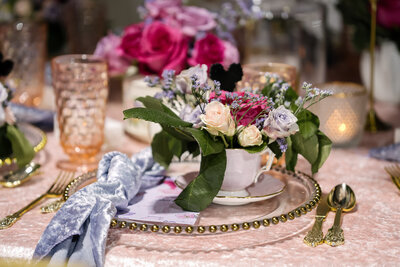 Teacup vase table setting for kids birthday event