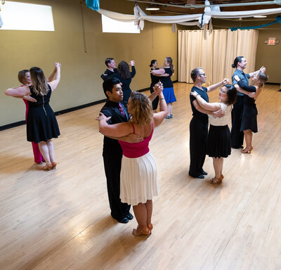 A group ballroom dance class taking place at Dancers Studio St. Paul, MN.