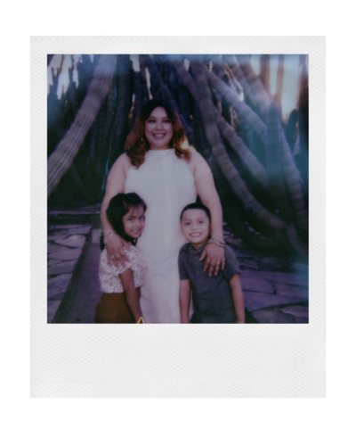 family photo of two kids and a mom at the desert botanical gardens in arizona