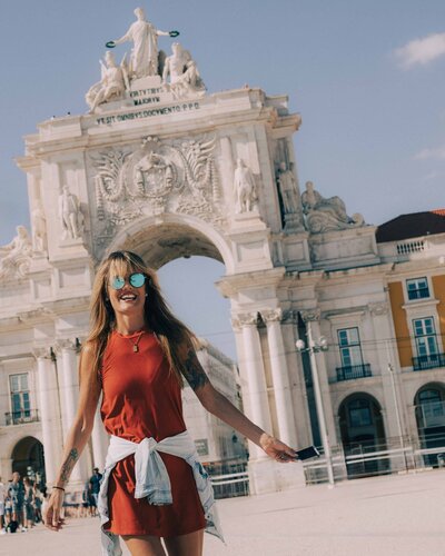 Portugal Lifestyle Portrait of a woman in a burnt orange mini dress