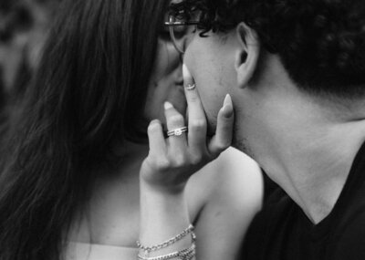 newly engaged couple kissing south florida