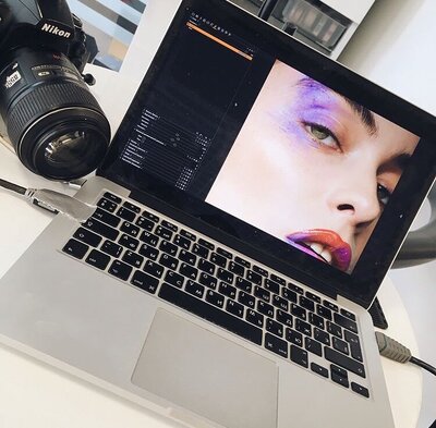 Laptop with makeup photoshoot images