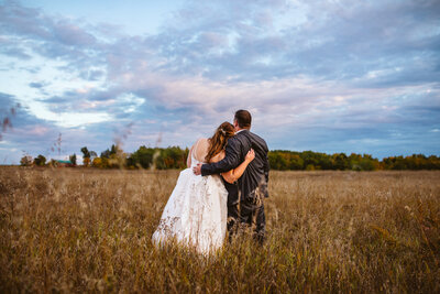 Bride and groom hugging - Nevis, Minnesota