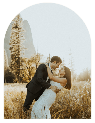 bride & groom kissing at the beach