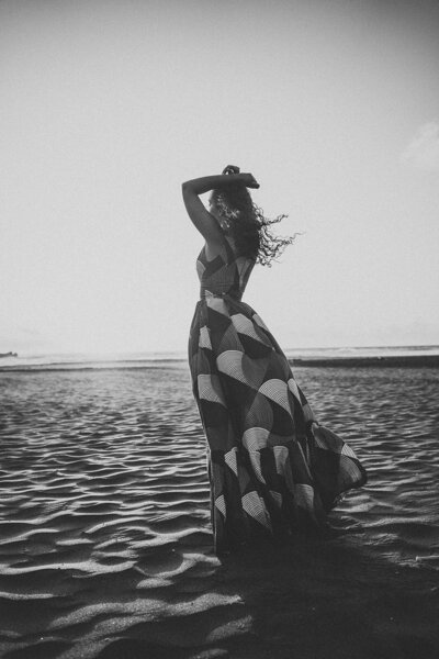 Personal brand image of woman dancing on the beach