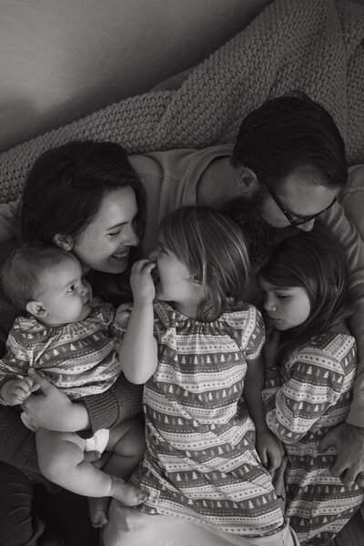 woman & child standing on log