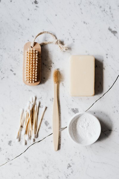 Toiletry items on a marble benchtop