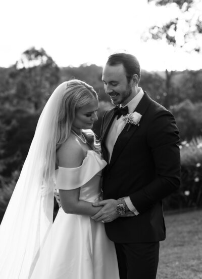 bride and groom tucked waves, glam makeup