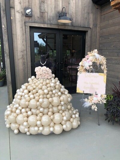 Unique pearl balloon display for a grand opening or upscale event decor.